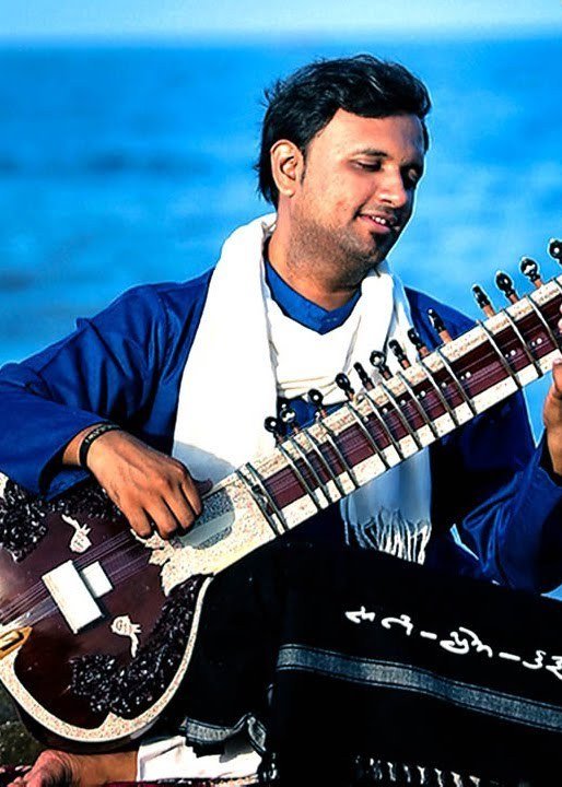 Playing beside the sea, the gourd catching the light