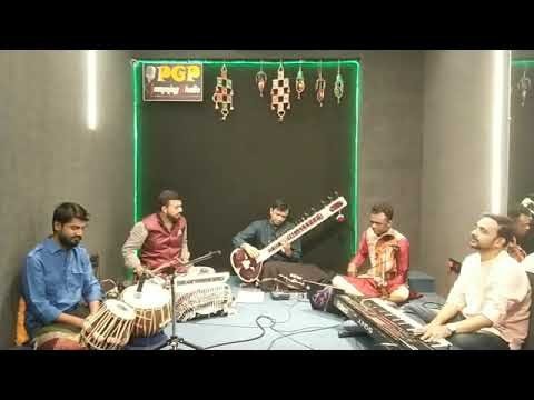 On stage with tabla and harmonium