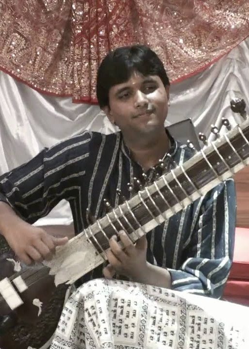 Seated at the instrument before a concert