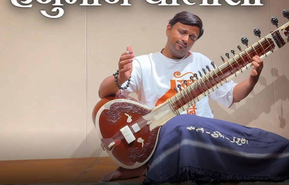 Sitar accompaniment at a temple gathering