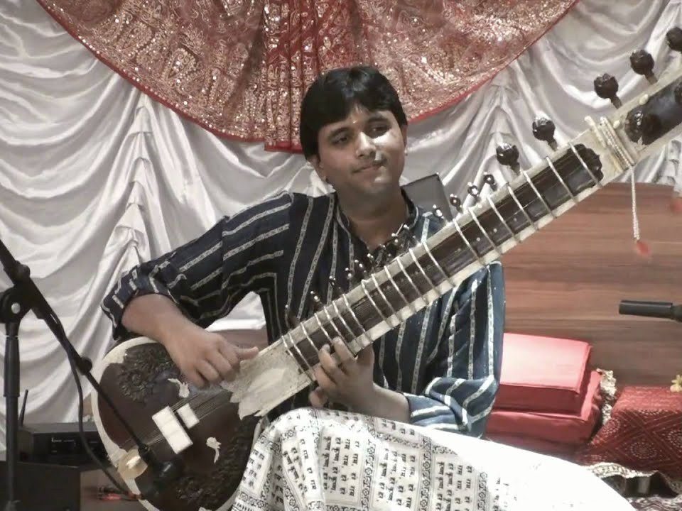 Seated at the instrument